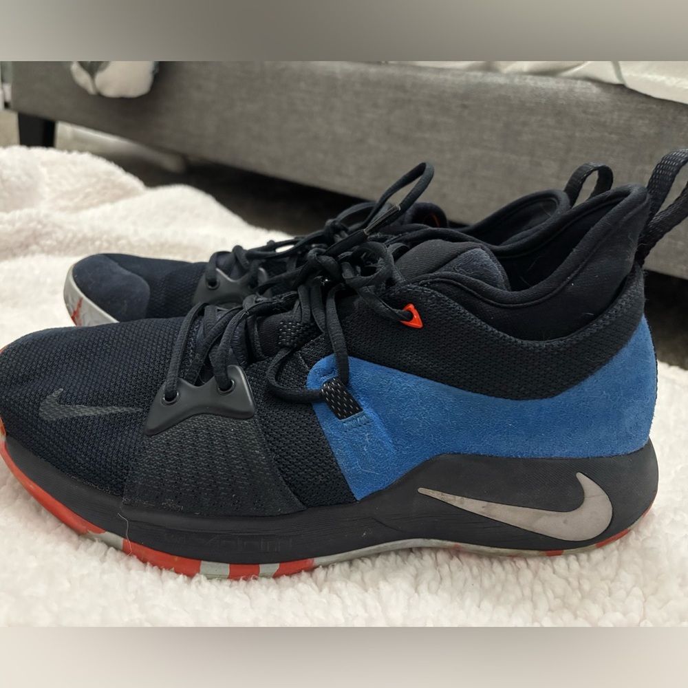 Nike Black and Blue Sneakers with Orange Accents